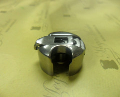 Шпульный колпачок