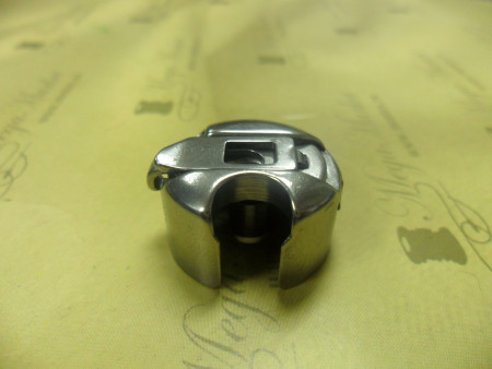 Шпульный колпачок