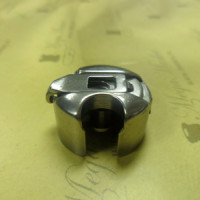 Шпульный колпачок