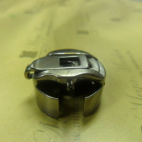 Шпульный колпачок